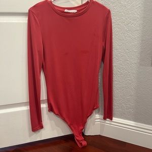 Salmon colored bodysuit